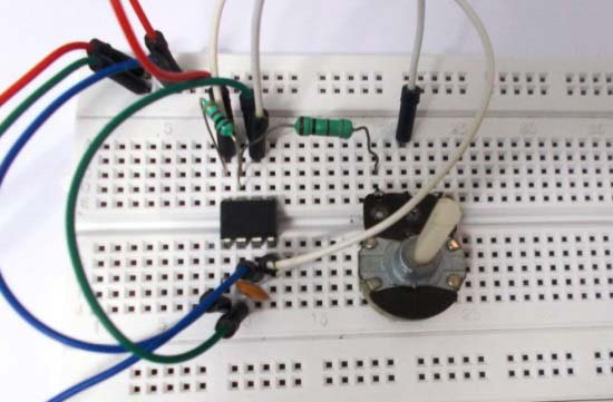 Assembled 555 Timer Signal Generator on breadboard for Arduino Frequency Counter testing showing component placement and wiring