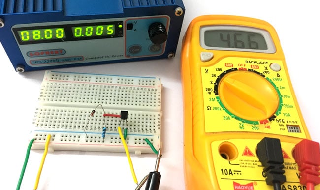Practical implementation of zener voltage regulator overvoltage protection circuit on breadboard showing component placement and connections