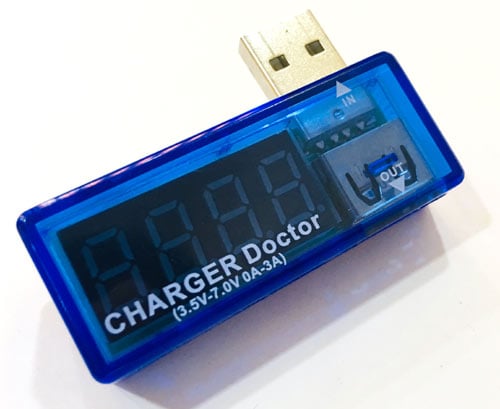USB Ammeter digital display showing voltage and current measurement for Arduino power consumption testing