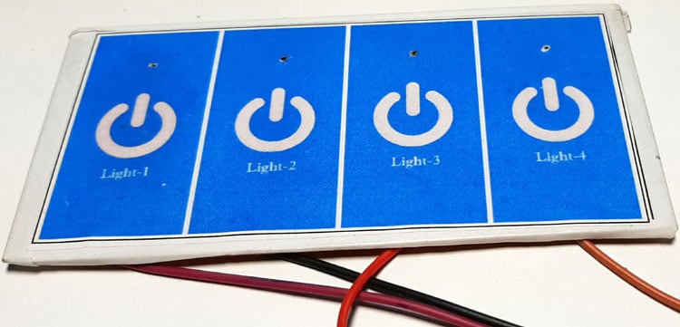 Four-channel ESP32 capacitive touch sensor panel with labels