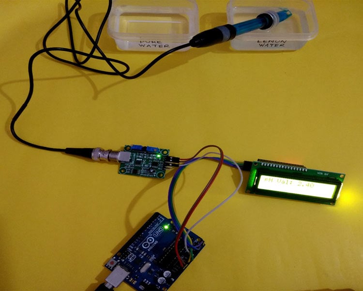 Arduino pH meter showing acidic pH reading of 2.3 when measuring lemon water solution