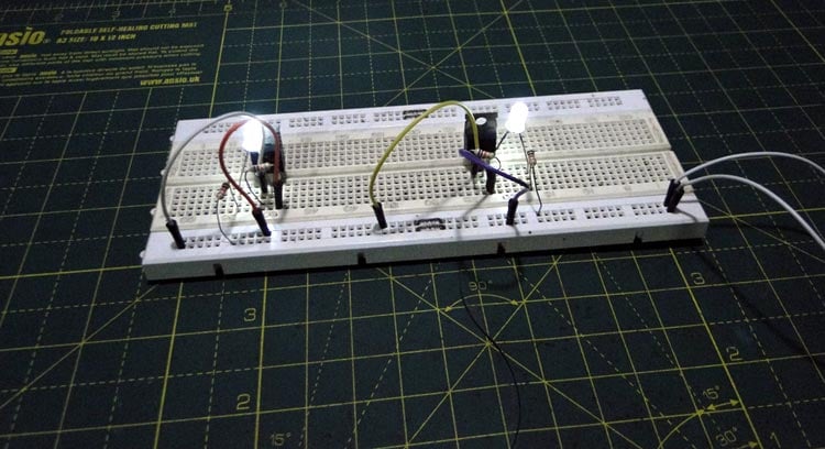 Practical demonstration of MOSFET switching circuit showing N-channel and P-channel MOSFET switch circuit operation with LED load indicators