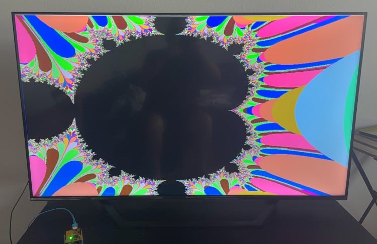 Arduino development board connected to an HDMI display using a custom ArduTV