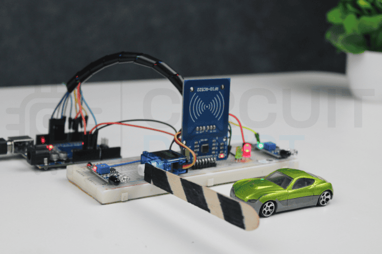 Serial monitor output displaying RFID card detected but access denied due to insufficient balance in automated toll gate system
