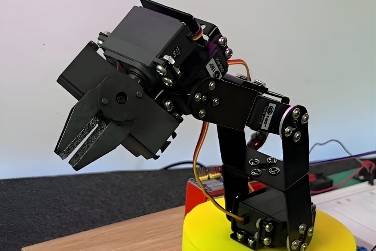 DIY six-axis robotic arm built with 3D-printed parts controlled by Arduino for precise multi-axis manipulation