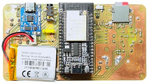Bottom view of ESP32 retro game console PCB showing soldering points, resistors, capacitors, and connection traces