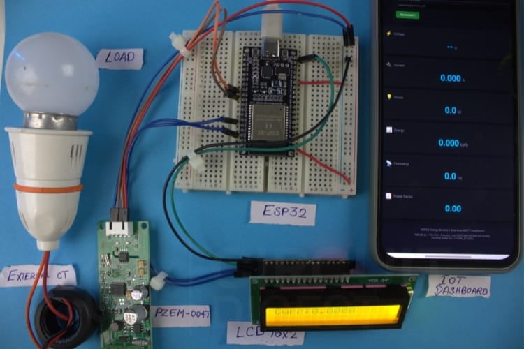 Physical hardware setup of IoT based smart energy meter project showing ESP32, PZEM-004T module, LCD display, and CT sensor assembly
