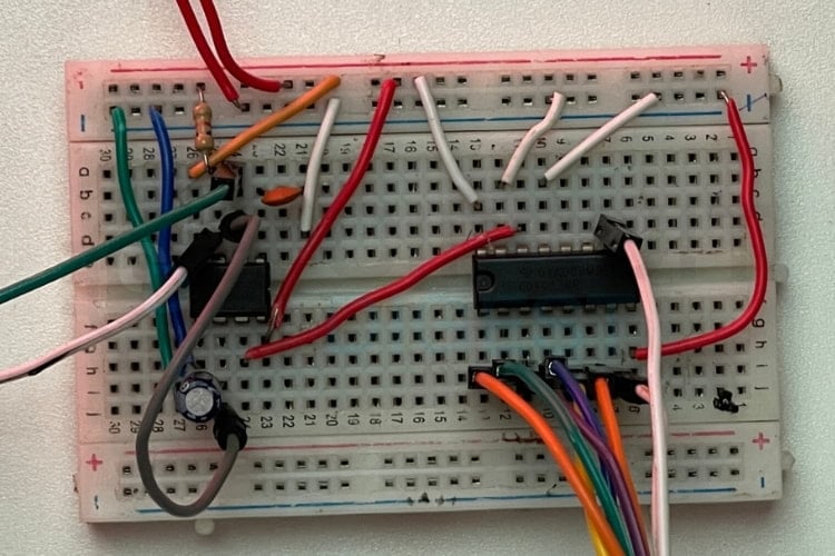 LED chaser circuit board assembly on breadboard with 555 timer and CD4017