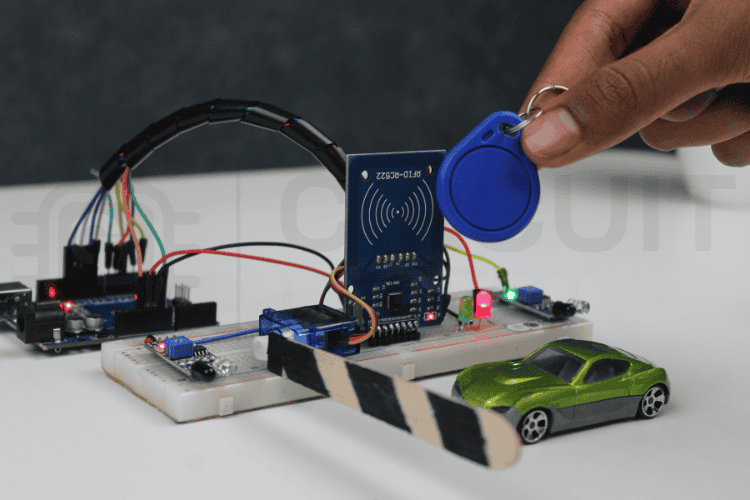 Red LED illuminated showing access denied status in automatic toll gate system project 