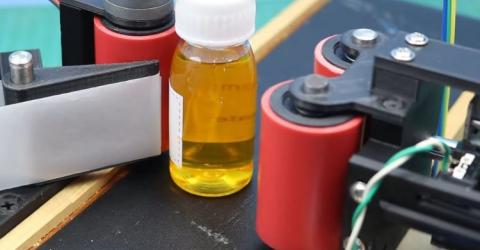 Build a DIY Arduino Bottle Labeling Machine